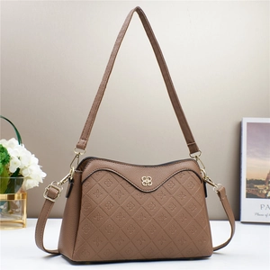 Brown leather crossbody bag with quilted rhombus pattern and gold logo detail