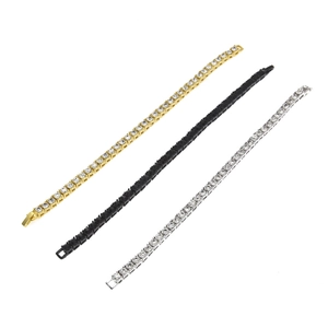 Close-up of three 5mm rhinestone tennis bracelets in gold, silver, and black finish