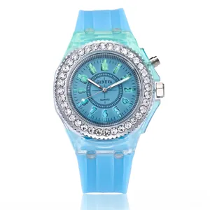 Detail of light blue translucent LED watch with rhinestones and luminous hands