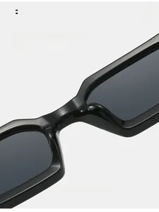 Close-up of integrated comfortable nose pads on black rectangular frame sunglasses