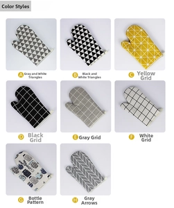 Detail view of cotton-linen oven mitts in eight varied Nordic patterns with hanging loops