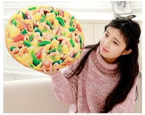 Detail of creative round pizza plush pillow with realistic toppings and soft texture