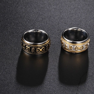 Vintage stainless steel spinner ring with engraved Six-Syllable Mantra for men