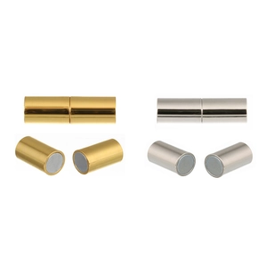Macro shot of cylindrical magnetic jewelry clasps in gold and silver for DIY crafting