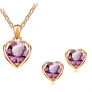 Roségold Herz Schmuckset mit rosa Kristallen bestehend aus Halskette und Ohrsteckern