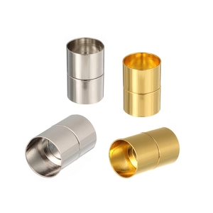 Macro view of cylindrical magnetic jewelry clasps in polished silver and gold finishes