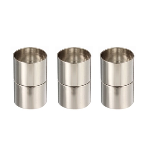 Close-up of polished silver cylindrical magnetic clasps for DIY jewelry making