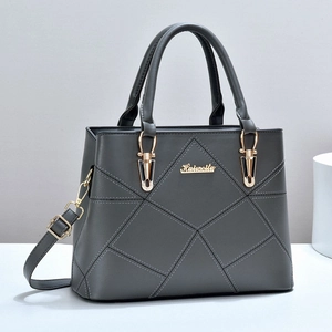 Deep grey large tote handbag with geometric quilted stitching and gold hardware