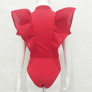Rear view of red one-piece swimsuit featuring mesh ruffle sleeves and a belted waist design