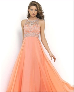 Elegant coral chiffon evening gown with silver sequins and halter backless design