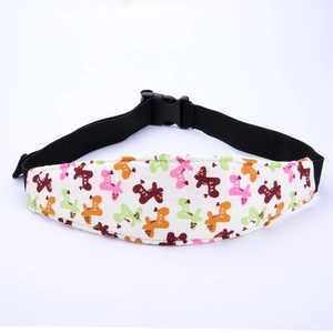 Detail of adjustable car seat head support belt with colorful deer print for toddler sleep