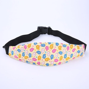 Close-up of yellow elephant print baby safety head support strap with adjustable buckle