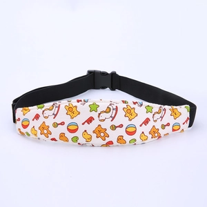 Detail of adjustable toddler car seat head support band with cute cartoon bear pattern