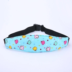 Detail of adjustable safety strap for infant car seat with blue monkey cartoon pattern