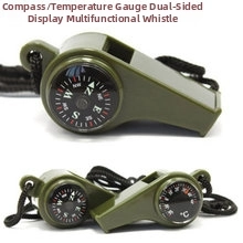Detail of army green 3-in-1 camping whistle with built-in compass and thermometer dial