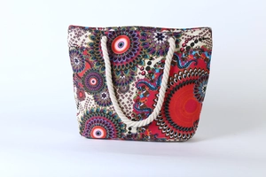 Detail of colorful mandala print on canvas tote bag with thick cotton rope handles