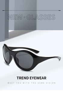 Macro detail of glossy black oversized Y2K cycling sunglasses with thick temples