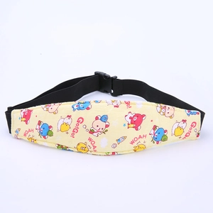 Detail view of cotton stroller head support strap with cartoon bear patterns and buckles
