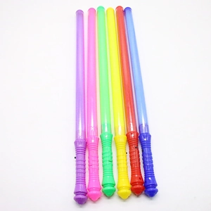 Row of six colorful 48cm glowing LED toy swords in purple pink green yellow red and blue