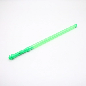 Detail of green plastic light sword toy with textured handle for concert cheering