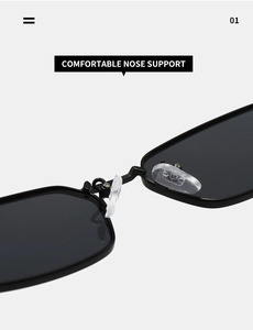 Macro view of adjustable soft silicone nose pads on black square frame sunglasses