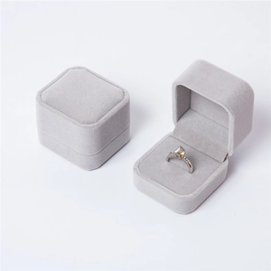 Square gray velvet jewelry box featuring flip cover design for rings and gift storage