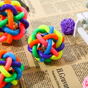 Colorful woven pet bell ball toy made of durable plastic rings for dogs and cats