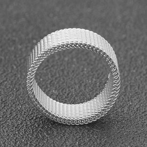Macro shot of 8mm silver mesh texture band with intricate woven steel detail