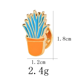 Detail view of small cactus enamel pin showing 1.8cm x 1.2cm dimensions and 2.4g weight