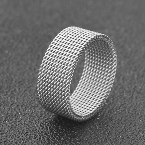 Macro shot of 8mm silver mesh texture ring showcasing intricate woven metal details