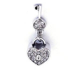 Close-up of a silver heart-shaped lock and key charm with micro-pave cubic zirconia