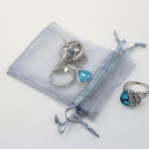 Blue heart crystal jewelry set with necklace and earrings in matching organza pouch
