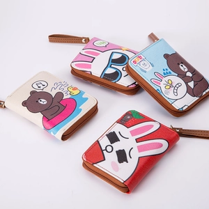Detail view of cartoon pattern PU leather wallets with zipper and wrist strap