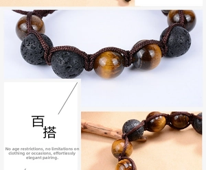 Detailed macro view of 12mm tiger eye stone and black lava rock woven beaded bracelet