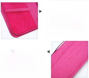 Detail of rose red travel wallet showing mesh passport pocket and neat edge stitching