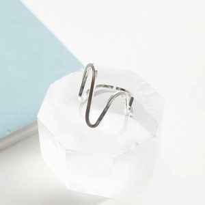Elegant minimalist S925 sterling silver wavy open ring on a crystal display base