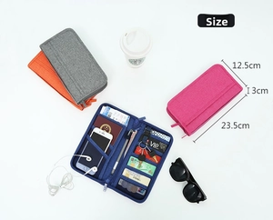 Travel document organizer with internal slots for passport and phone shown from a 45-degree angle