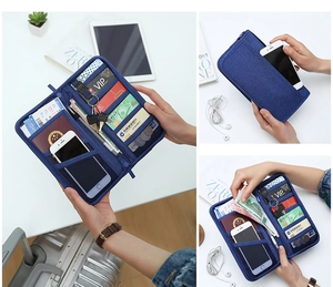 Detail of travel passport wallet interior featuring multiple card slots and phone pocket