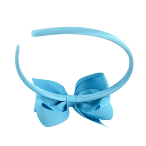 4-inch sky blue boutique ribbon bow headband for girls, handmade hair accessory on white background