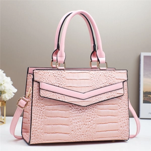 Pink faux crocodile embossed large capacity handbag with gold hardware and shoulder strap