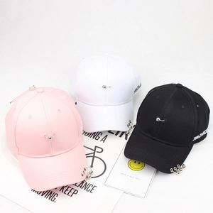Hip-hop baseball caps with metal rings and pins in pink, white, and black colors
