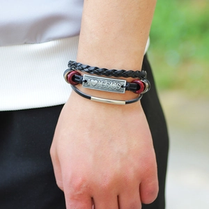 Braided leather bracelet with wood beads and I Love Jesus engraved metal plate