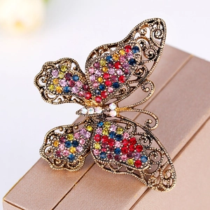Vintage butterfly brooch with multicolored rhinestones and antique bronze finish
