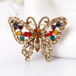 Vintage bronze butterfly brooch with colorful rhinestones and crystal accents