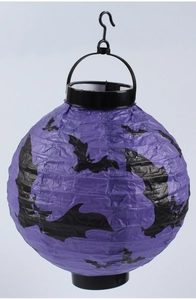 Detail of purple Halloween paper lantern with black bat silhouette and hanging hook