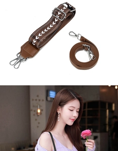 Interchangeable brown woven and leather shoulder straps with silver metal snap hooks