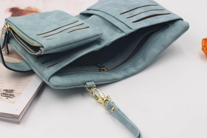 Detail view of light blue frosted PU leather wallet interior with multiple card slots