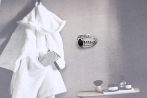 Detail view of vintage woven texture on 925 silver ring with black agate stone inlay