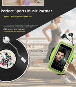 Detail of neon green sports armband with touch screen window and wired earphones
