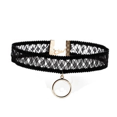 Detail of black lace choker necklace with gold round pendant and secure lobster clasp